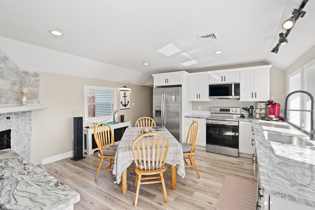 278 A Delano Road Marion, MA 02738 - Photo 8 of 32 a kitchen with a stove a sink and a microwave