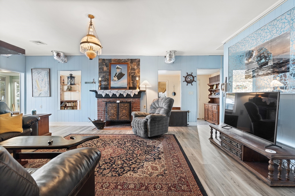 278 A Delano Road Marion, MA 02738 - Photo 9 of 32 a living room with furniture and a flat screen tv