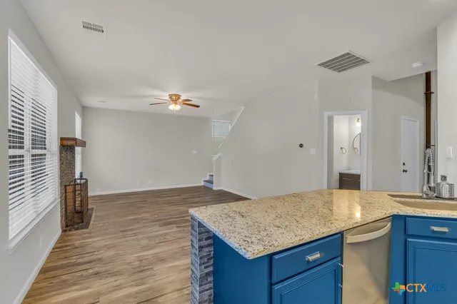 a bathroom with a tub and shower