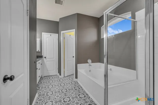 a house view with a garden space