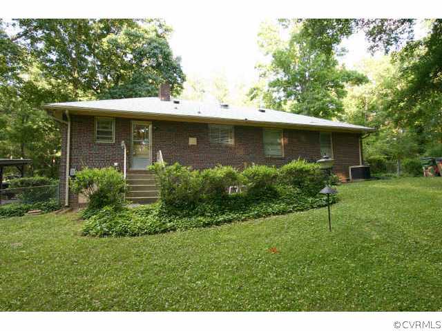1308 Castleton Road Richmond, VA 23225 - Photo 3 of 10 Other - Back View - Patio behind hedges