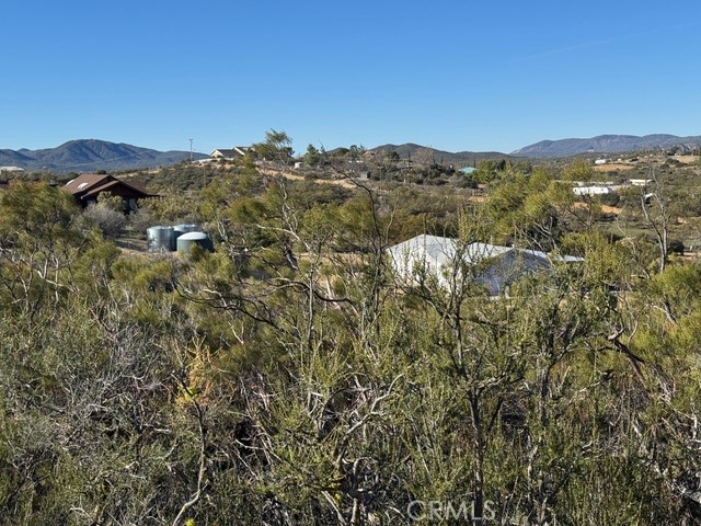 54740 Cave Rock Road Anza, CA 92539 - Photo 28 of 47 a view of a city with mountains in the background