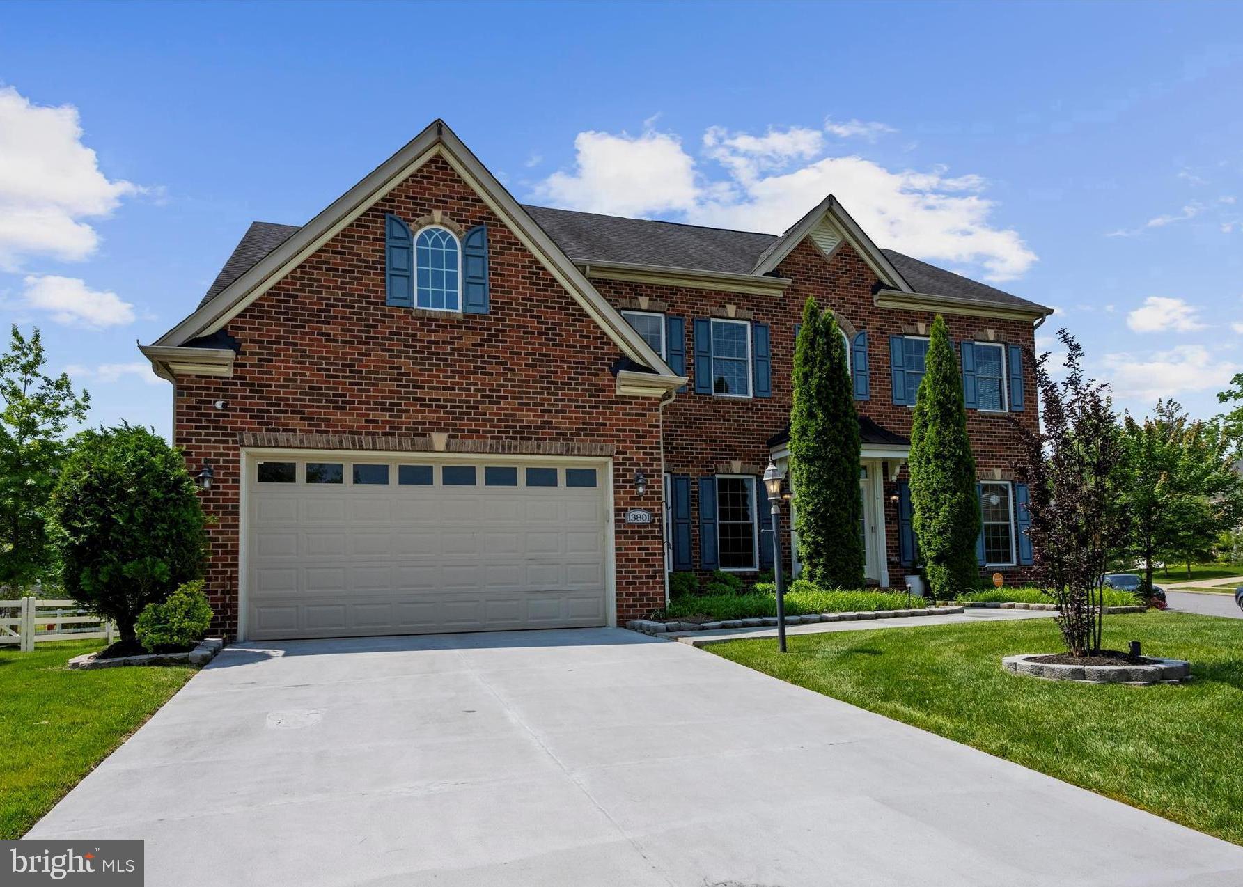 13801 Racetrack Field Court Bowie, MD 20720 - Photo 1 of 66 a front view of a house with a yard