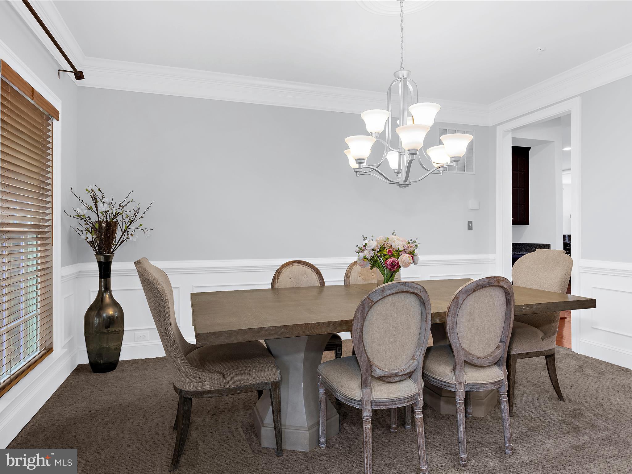 13801 Racetrack Field Court Bowie, MD 20720 - Photo 13 of 66 a dining room with furniture and chandelier