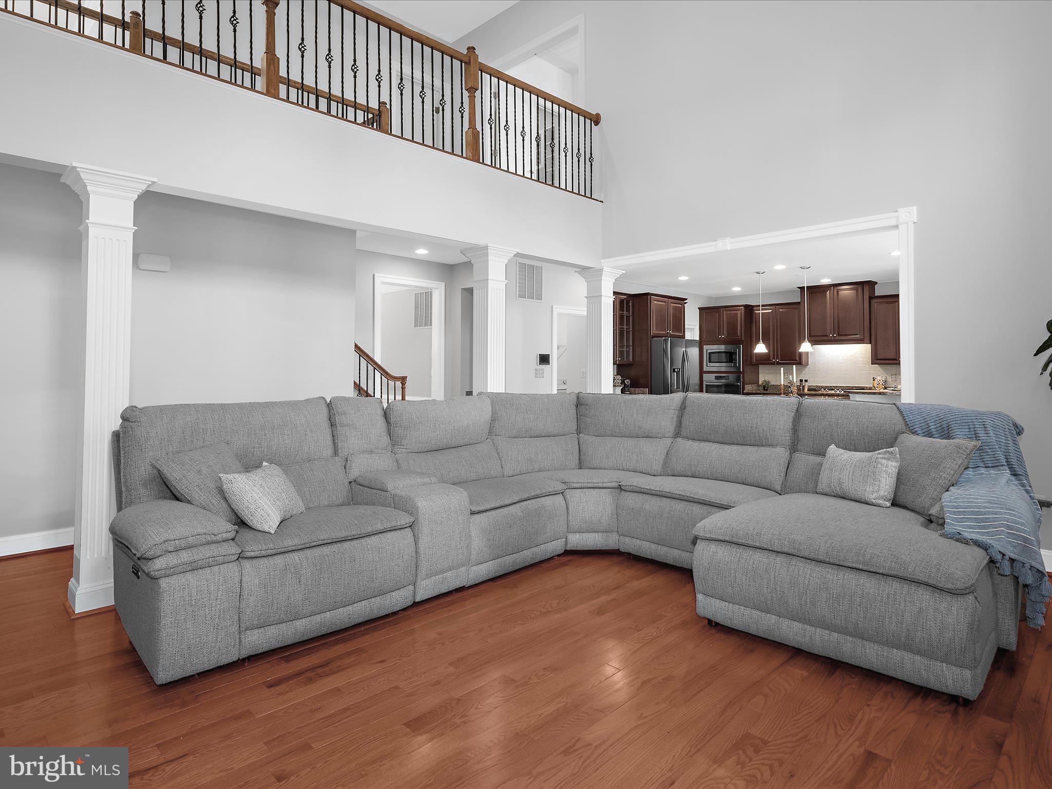 13801 Racetrack Field Court Bowie, MD 20720 - Photo 17 of 66 a living room with furniture and a wooden floor