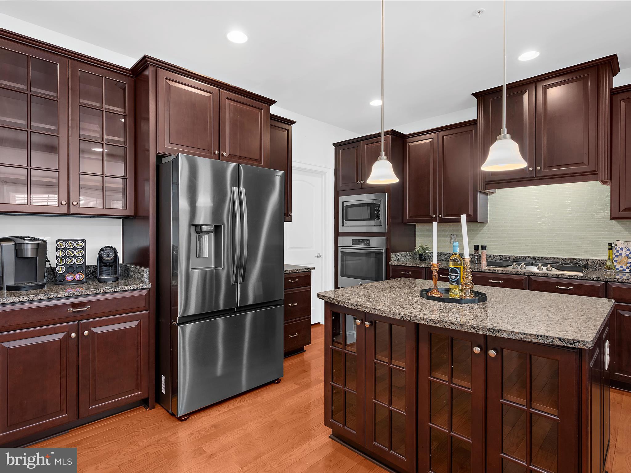 13801 Racetrack Field Court Bowie, MD 20720 - Photo 20 of 66 a kitchen with stainless steel appliances granite countertop a refrigerator a sink and a stove