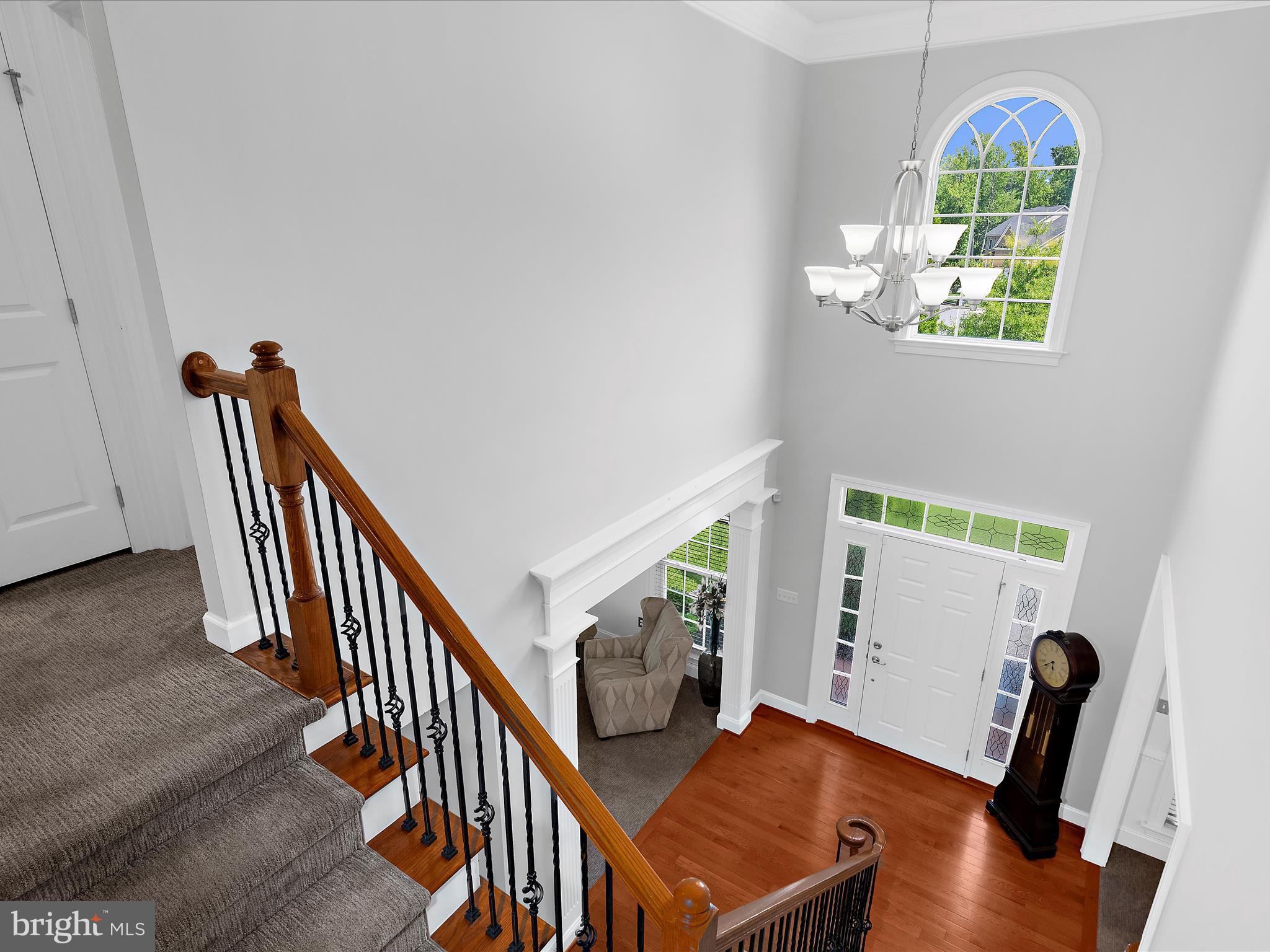 13801 Racetrack Field Court Bowie, MD 20720 - Photo 28 of 66 a view of a hallway with furniture and a window