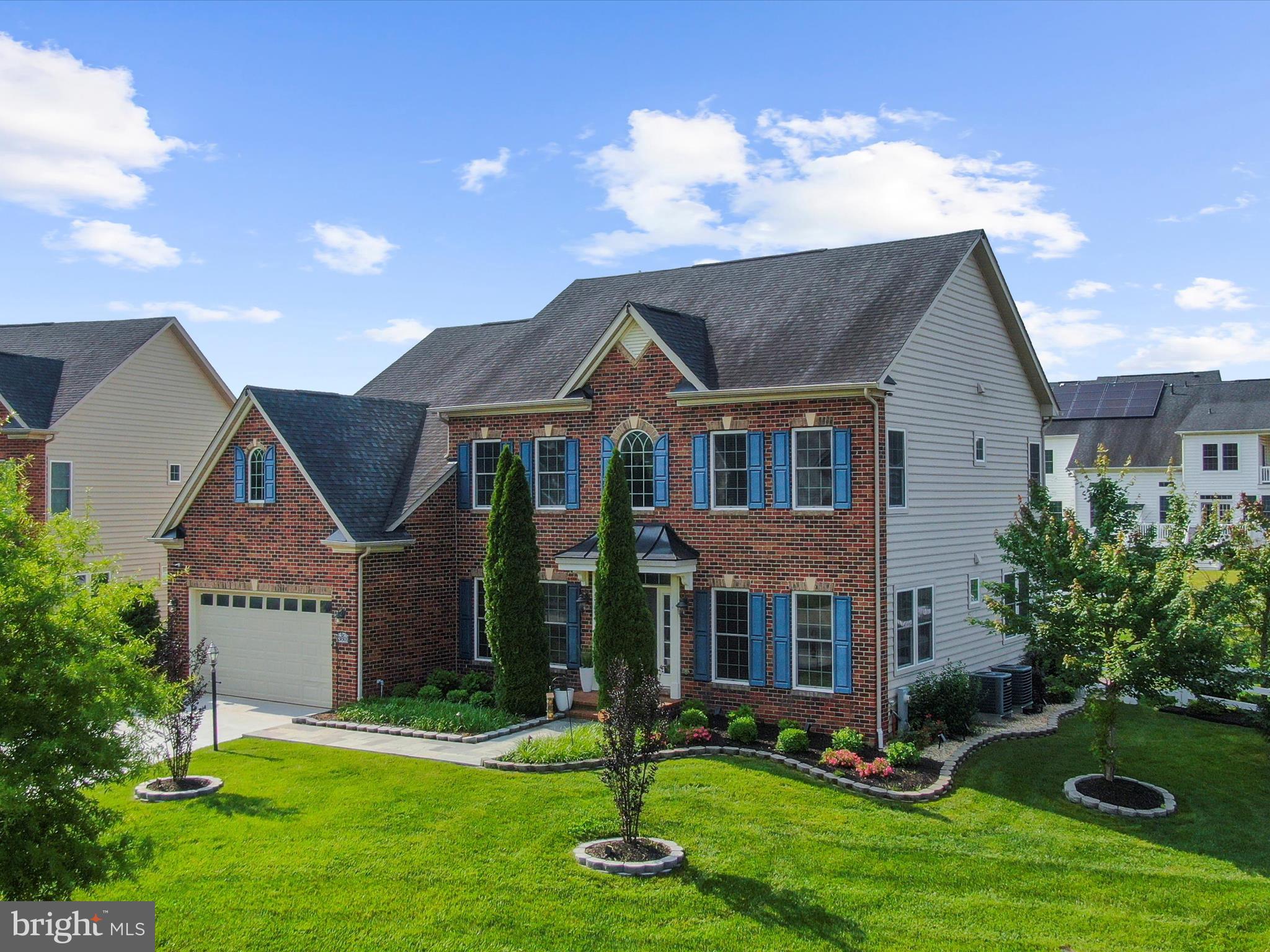 13801 Racetrack Field Court Bowie, MD 20720 - Photo 3 of 66 a front view of a house with a yard