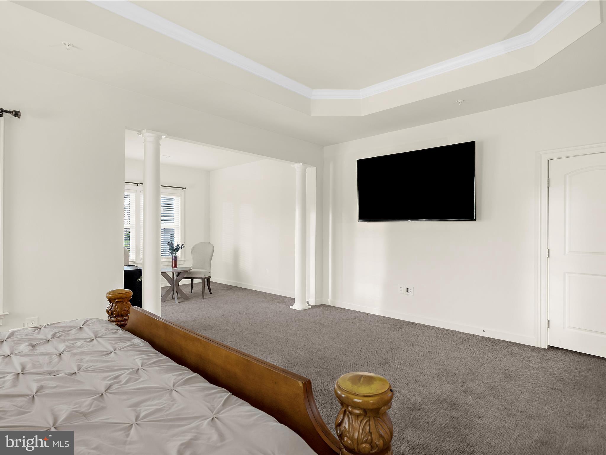 13801 Racetrack Field Court Bowie, MD 20720 - Photo 32 of 66 a bedroom with a bed and a flat screen tv