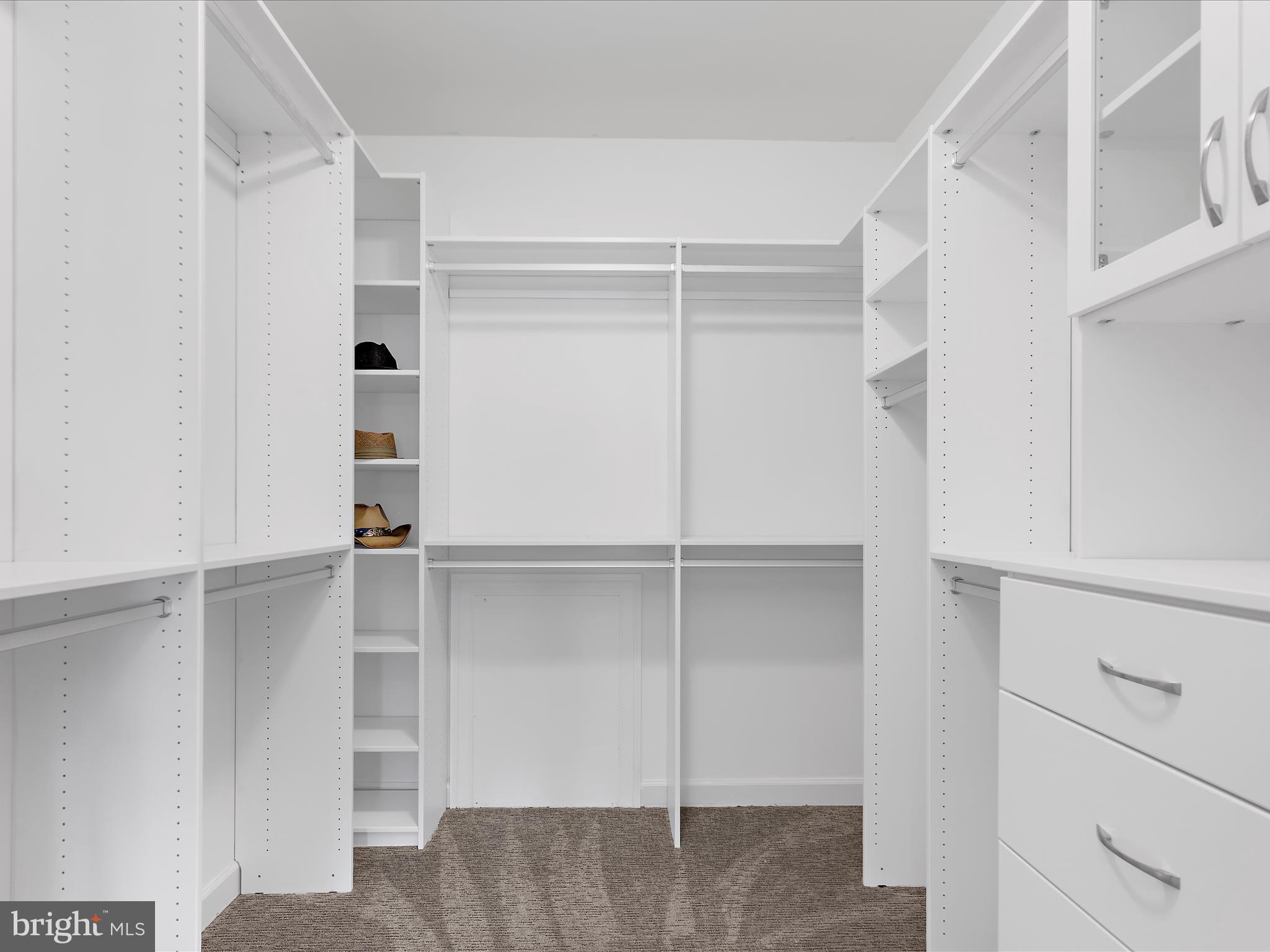 13801 Racetrack Field Court Bowie, MD 20720 - Photo 34 of 66 a view of walk in closet with empty racks