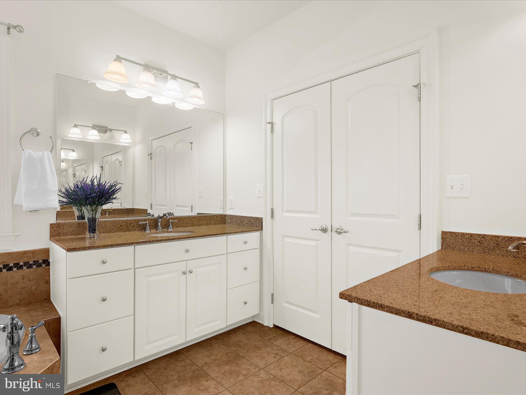 13801 Racetrack Field Court Bowie, MD 20720 - Photo 37 of 66 a bathroom with a granite countertop sink and a mirror