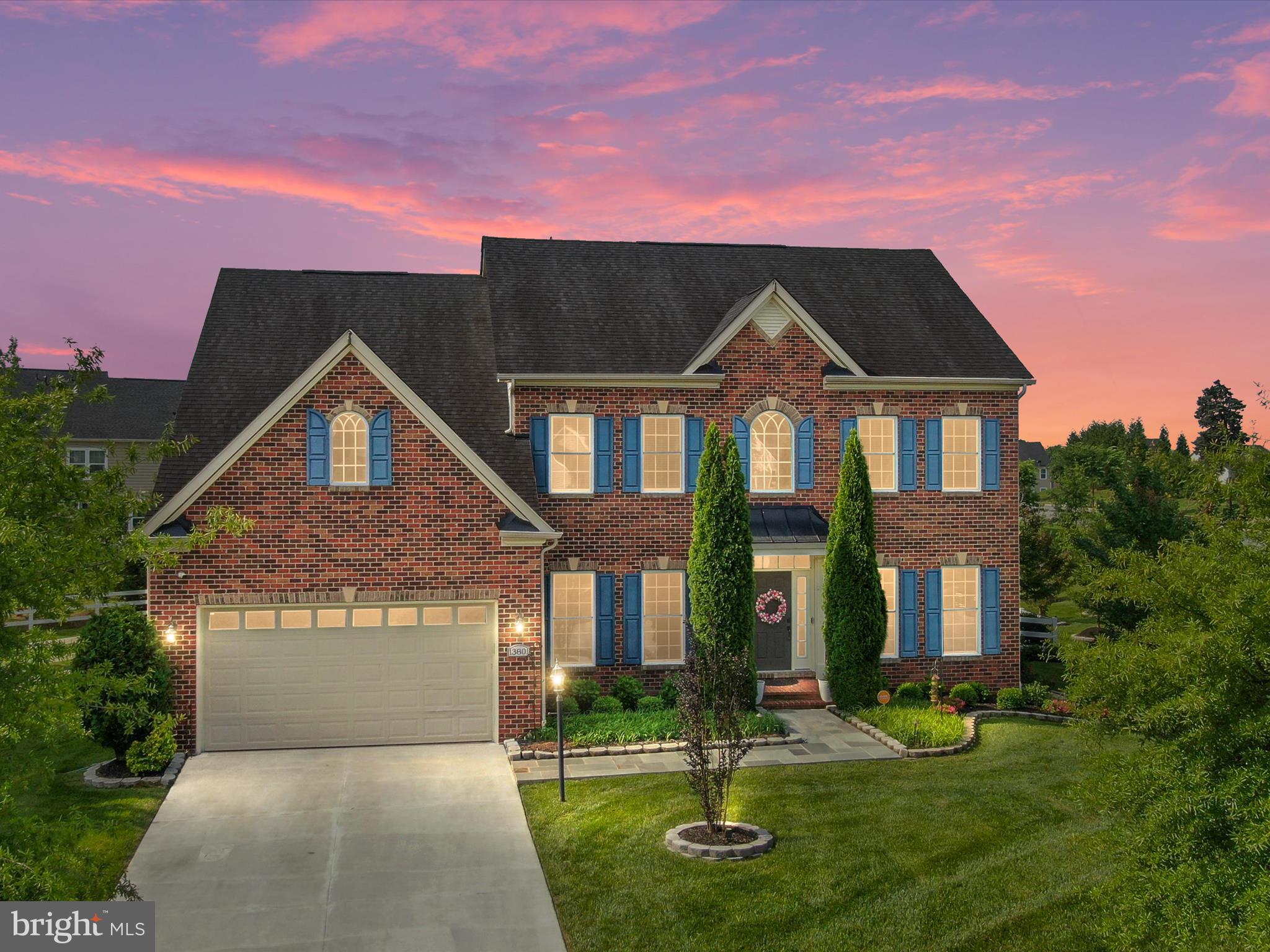 13801 Racetrack Field Court Bowie, MD 20720 - Photo 4 of 66 a front view of a house with garden
