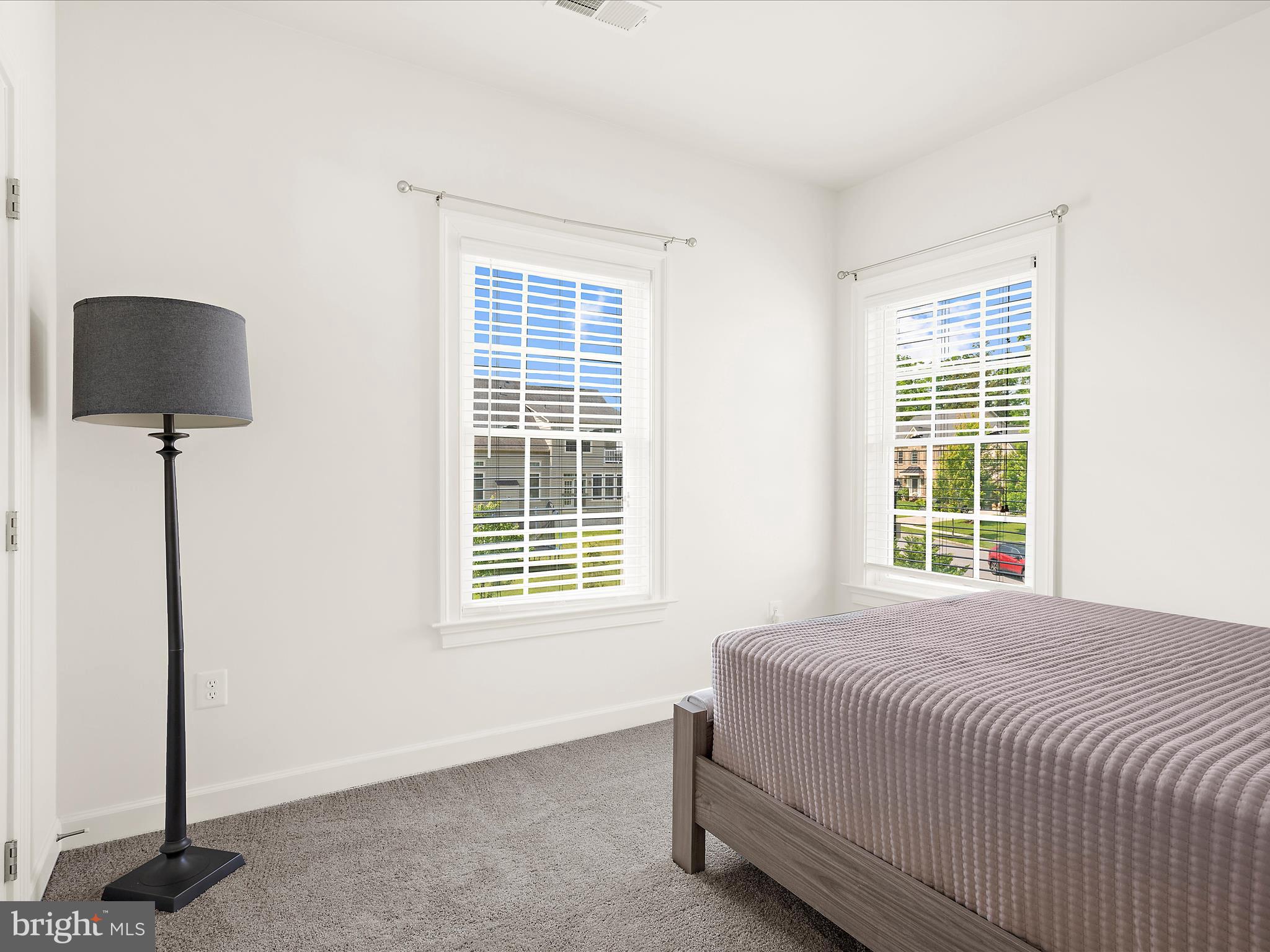 13801 Racetrack Field Court Bowie, MD 20720 - Photo 41 of 66 a bedroom with a bed and a window