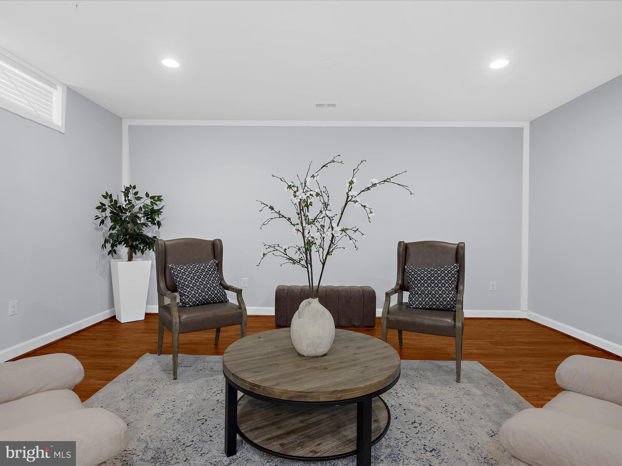 13801 Racetrack Field Court Bowie, MD 20720 - Photo 49 of 66 a living room with furniture and a potted plant