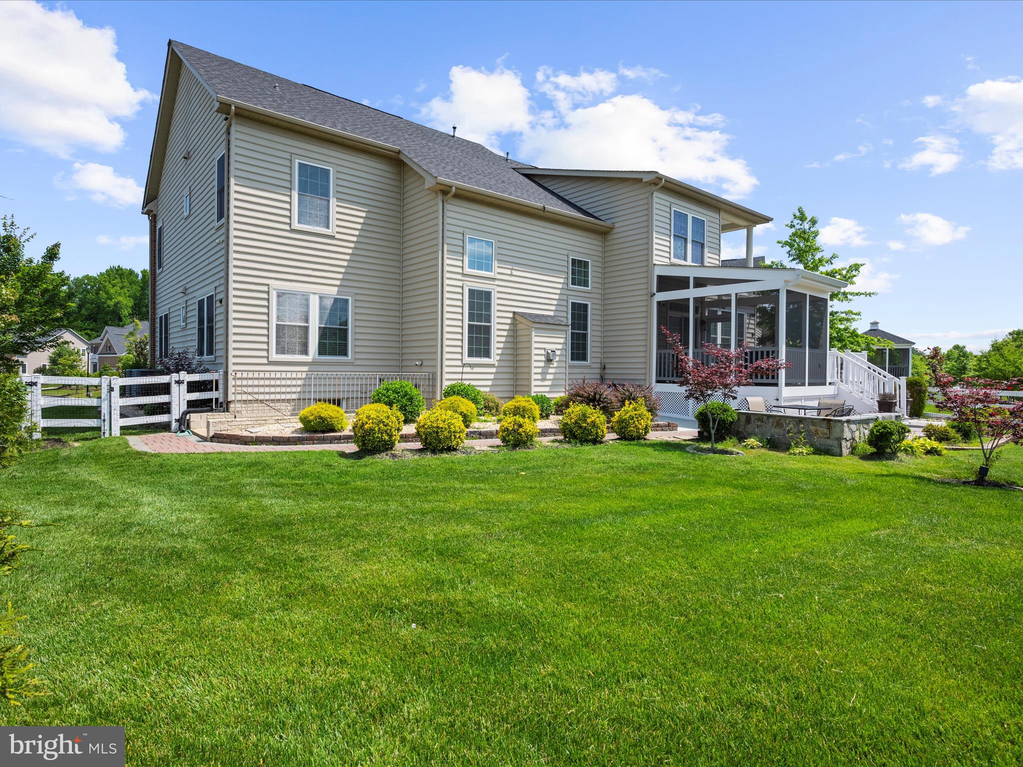 13801 Racetrack Field Court Bowie, MD 20720 - Photo 61 of 66 a front view of house with yard and outdoor seating