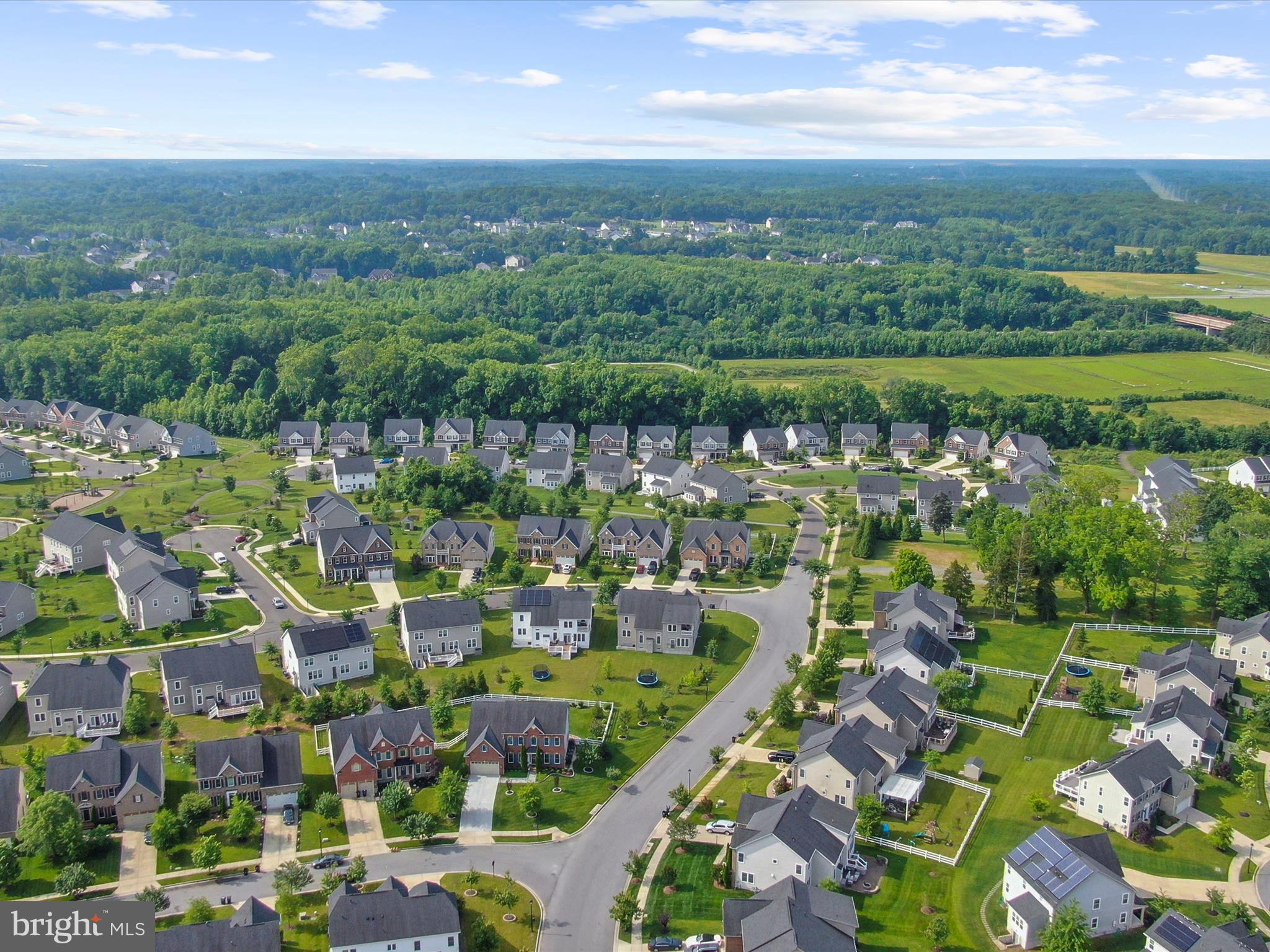 13801 Racetrack Field Court Bowie, MD 20720 - Photo 8 of 66 an aerial view of lake and residential houses with outdoor space