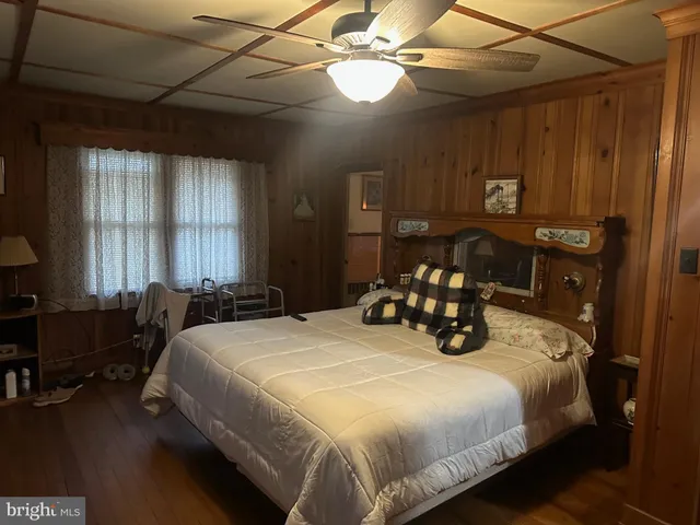a bathroom with a sink a mirror and a shower