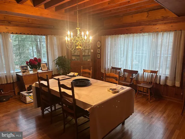 a dinning table and chairs in a patio