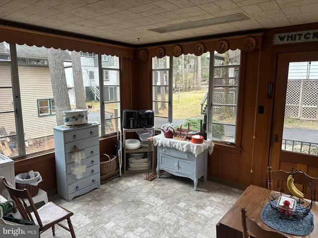 a room with furniture and a window