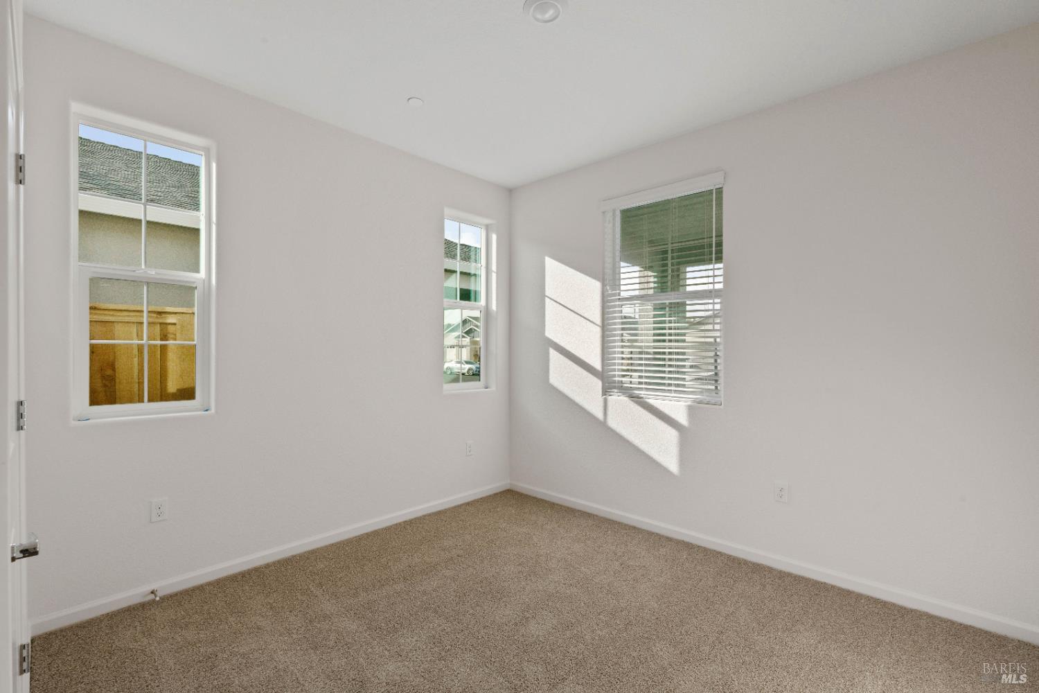 2241 Park Place Rio Vista, CA 94571 - Photo 16 of 17 an empty room with windows