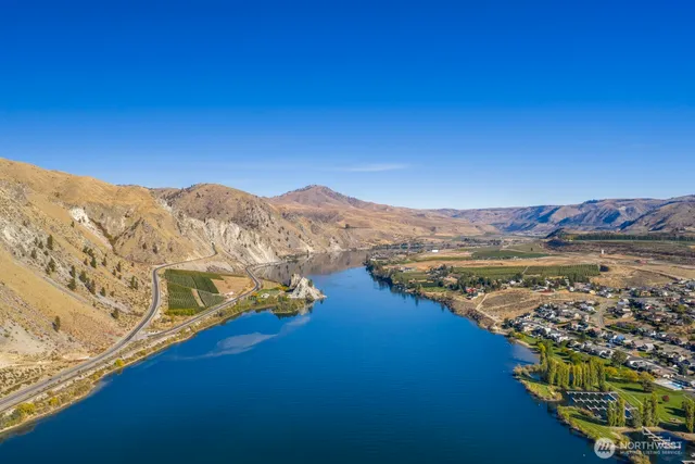 a view of an ocean and a mountain