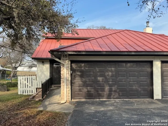 a view of a house with a garage