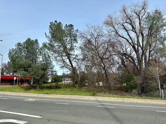 0 Front Street Shasta Lake, CA 96019 - Photo 13 of 18 a view of a yard in front of a house