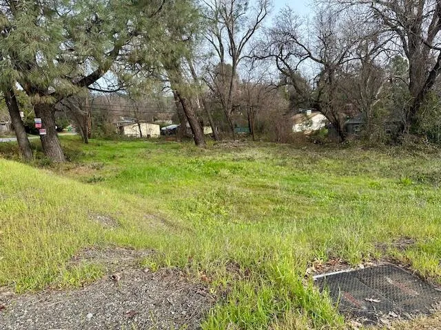 a fire hydrant in the middle of a field