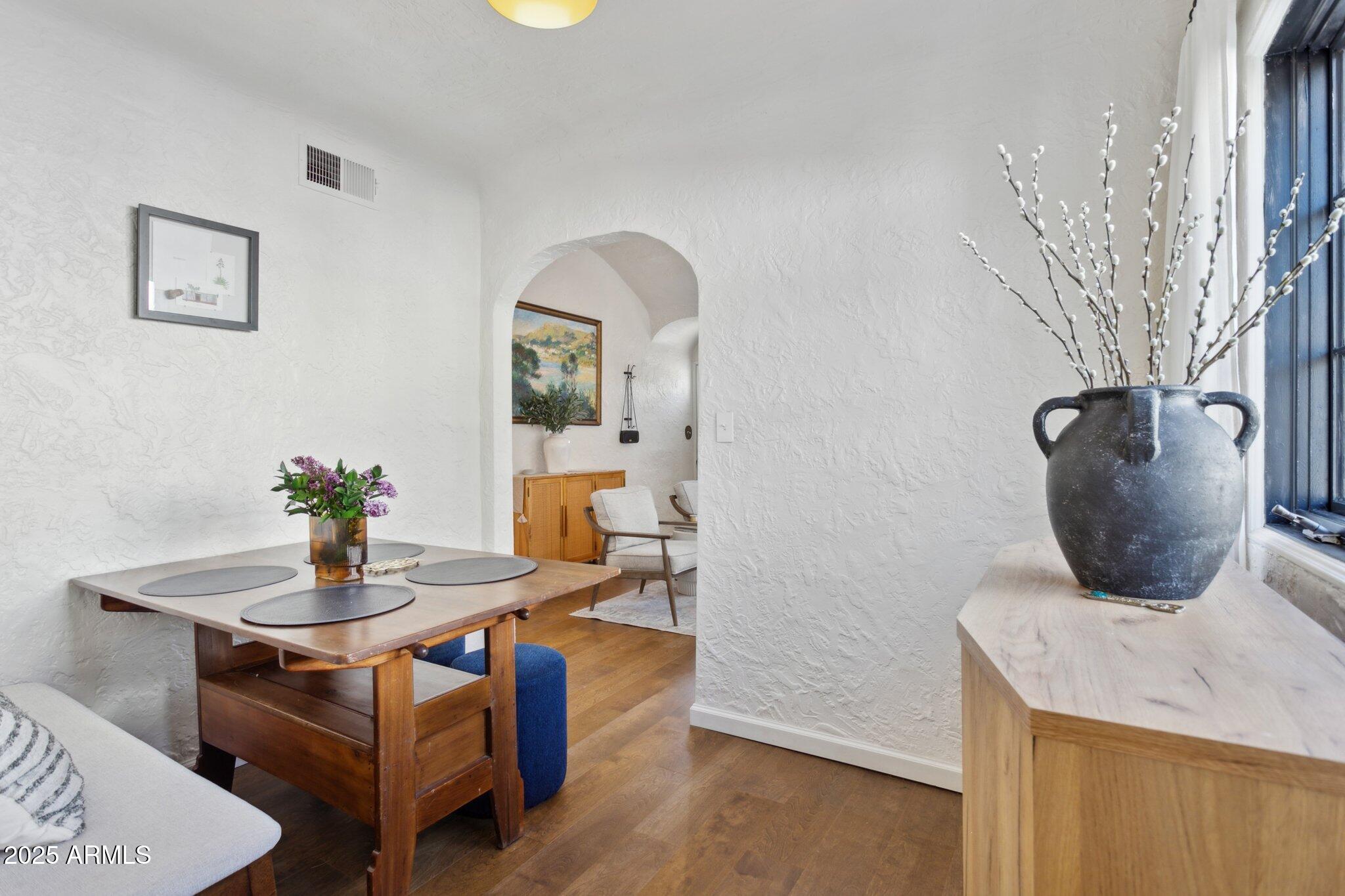1111 East Coronado Road Phoenix, AZ 85006 - Photo 11 of 77 a living room with furniture and wooden floor