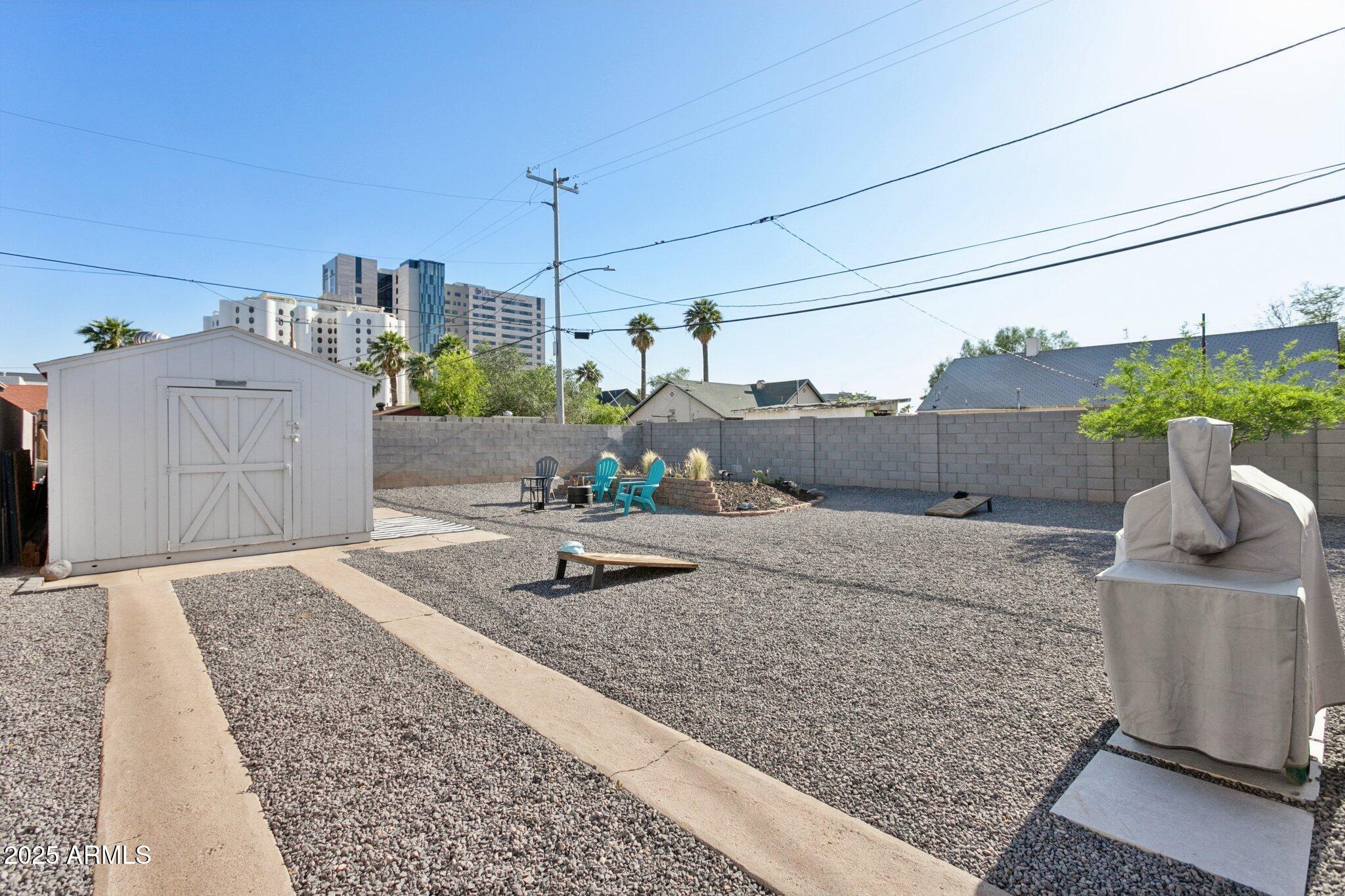 1111 East Coronado Road Phoenix, AZ 85006 - Photo 20 of 77 a living room with furniture and wooden floor