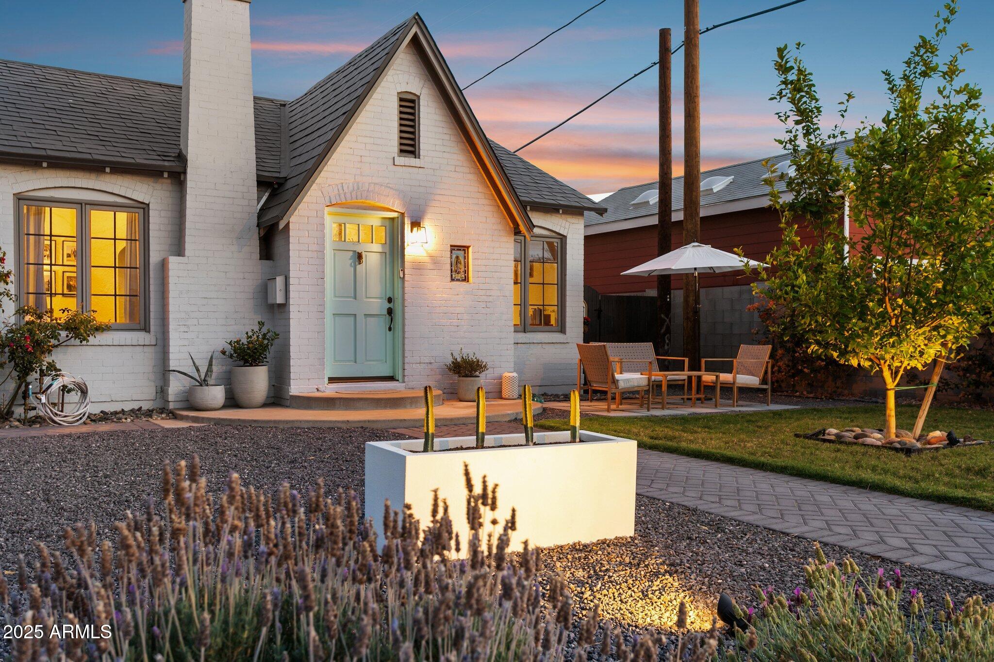 1111 East Coronado Road Phoenix, AZ 85006 - Photo 2 of 77 a view of a house with swimming pool and sitting area