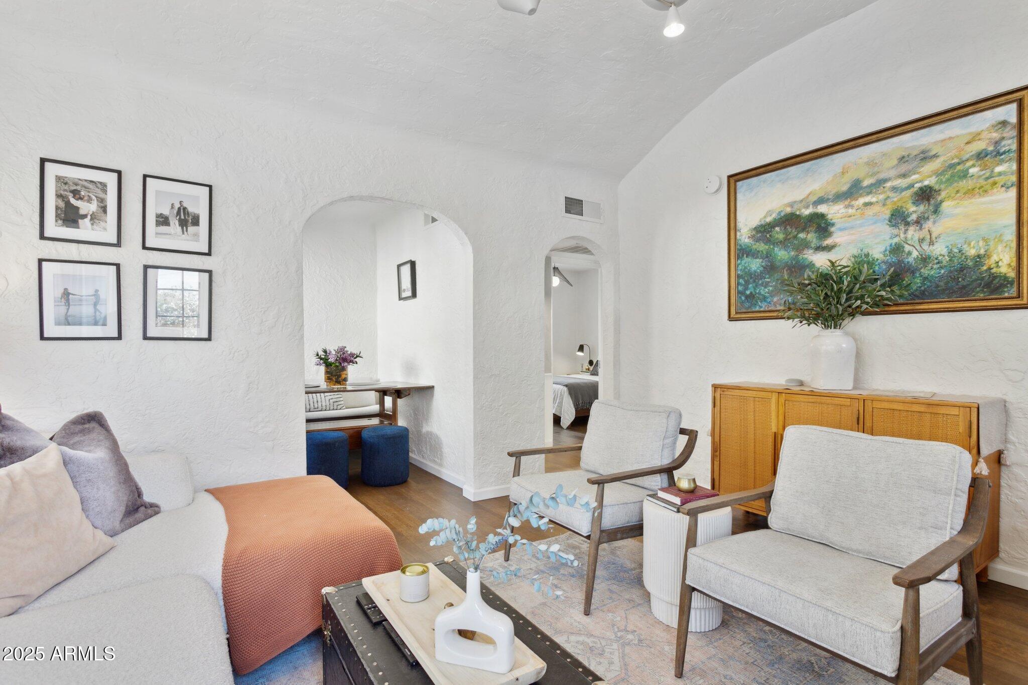 1111 East Coronado Road Phoenix, AZ 85006 - Photo 38 of 77 a living room with furniture and a large window