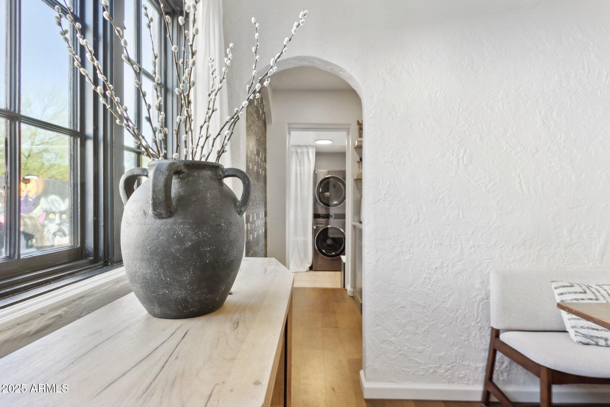 1111 East Coronado Road Phoenix, AZ 85006 - Photo 40 of 77 a view of a living room with a fireplace and wooden floor