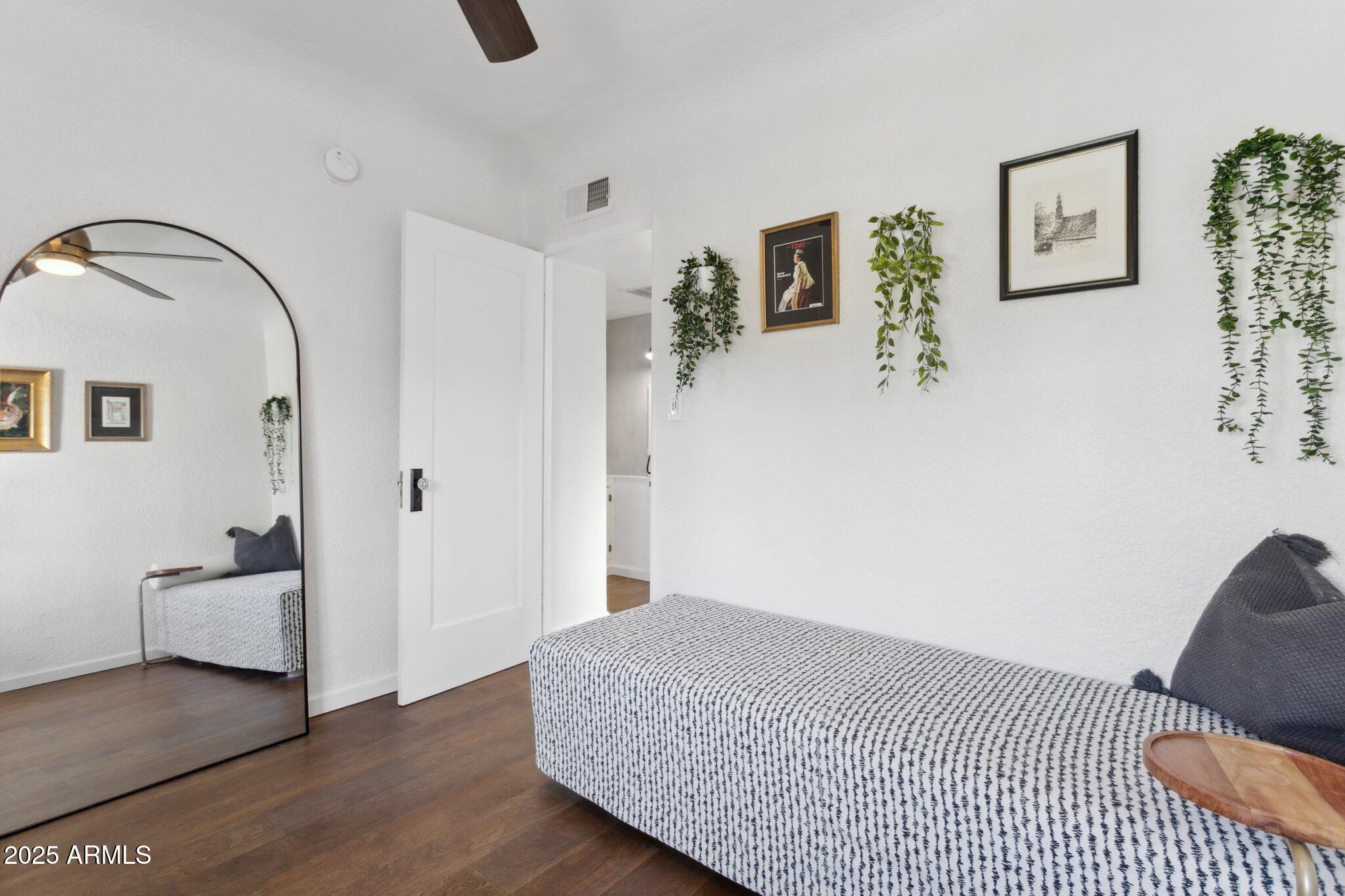 1111 East Coronado Road Phoenix, AZ 85006 - Photo 50 of 77 a bedroom with a bed and couch