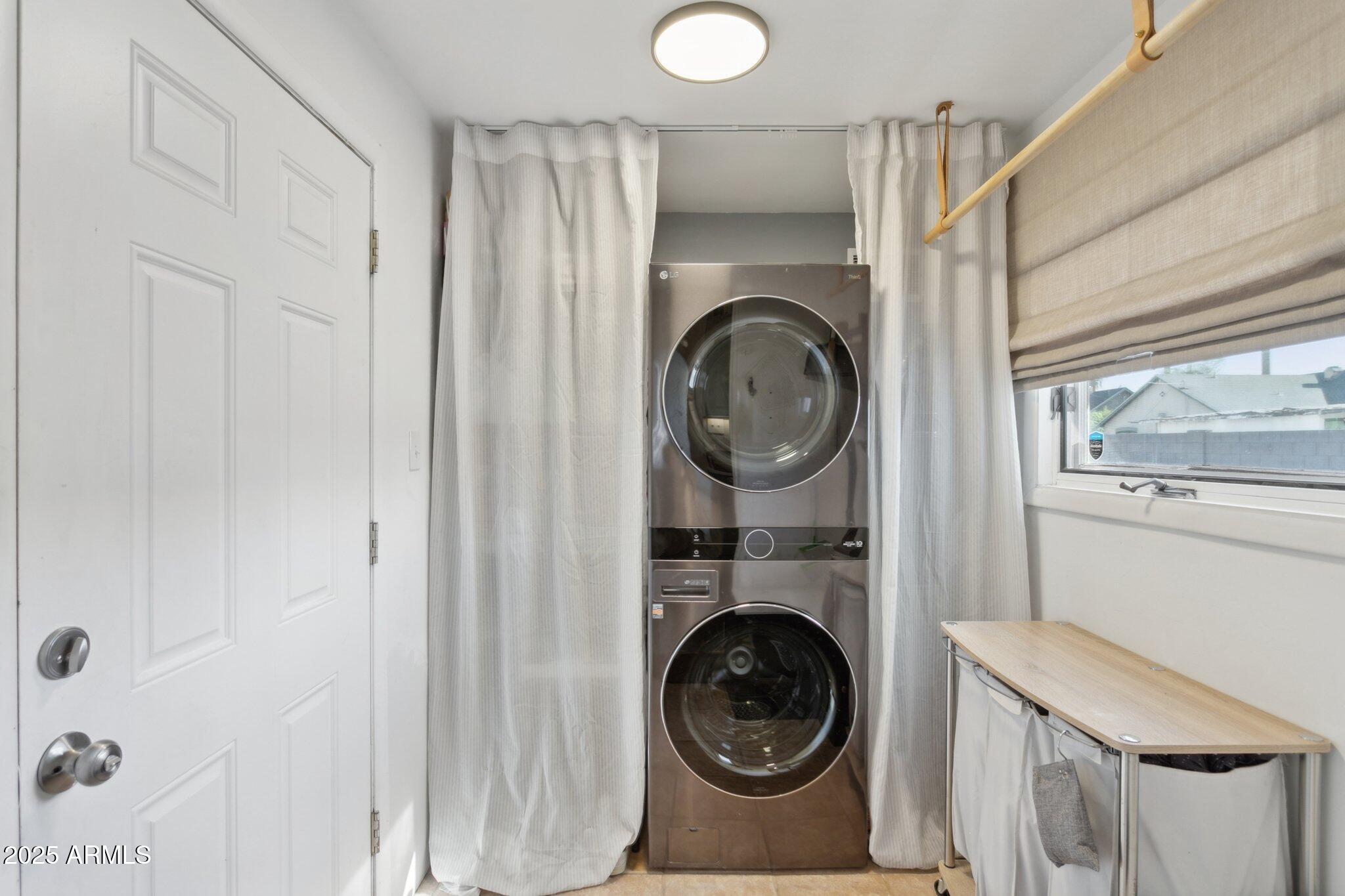 1111 East Coronado Road Phoenix, AZ 85006 - Photo 53 of 77 a view of a hallway with washer and dryer