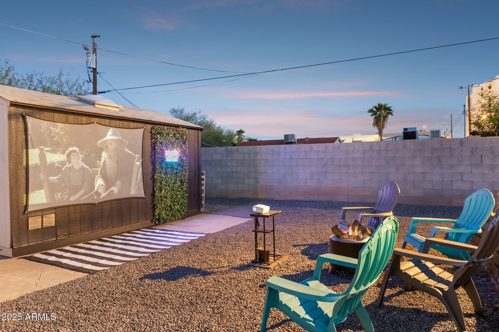 1111 East Coronado Road Phoenix, AZ 85006 - Photo 55 of 77 a patio with table and chairs and potted plants