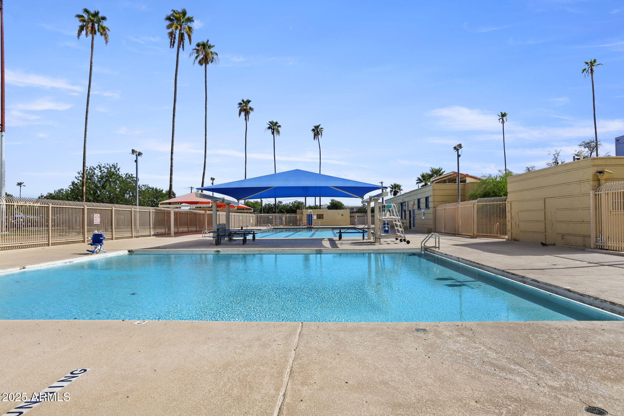 1111 East Coronado Road Phoenix, AZ 85006 - Photo 61 of 77 a view of a swimming pool with chairs