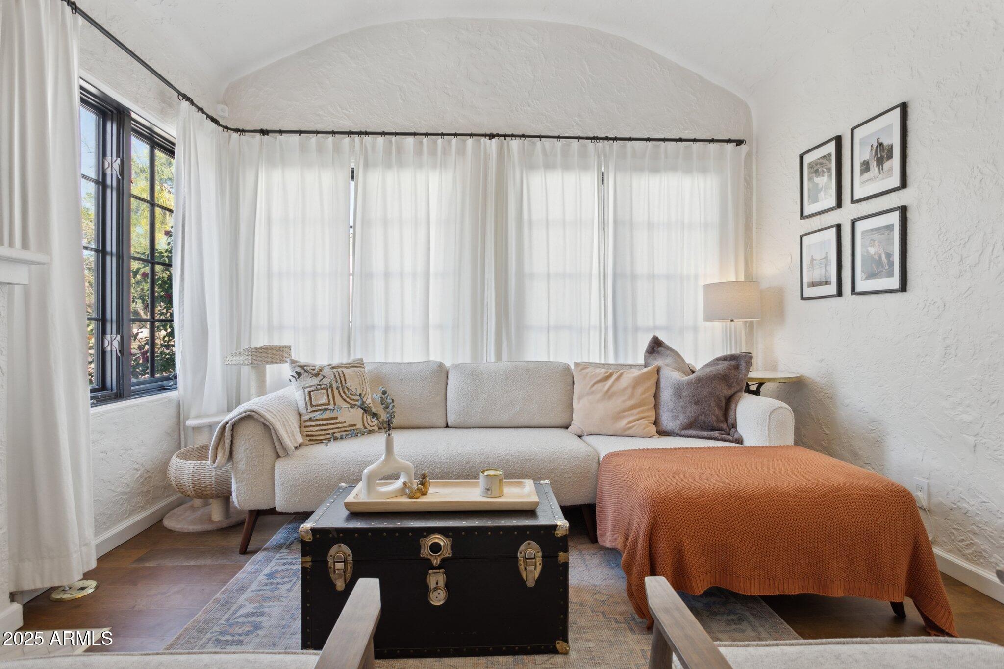1111 East Coronado Road Phoenix, AZ 85006 - Photo 6 of 77 a living room with furniture and a large window