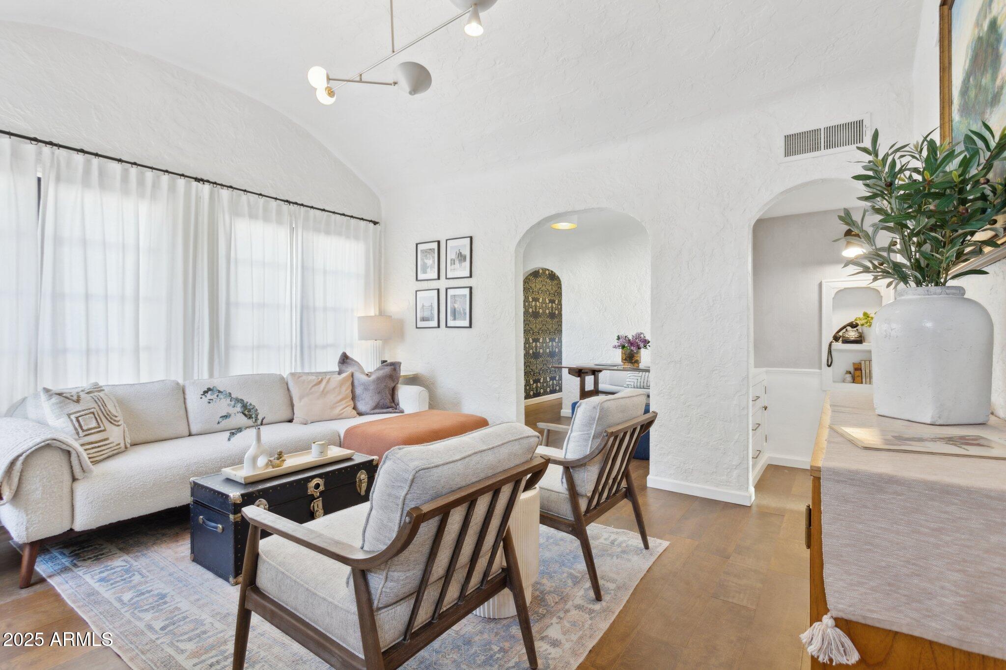 1111 East Coronado Road Phoenix, AZ 85006 - Photo 7 of 77 a living room with furniture and a large window