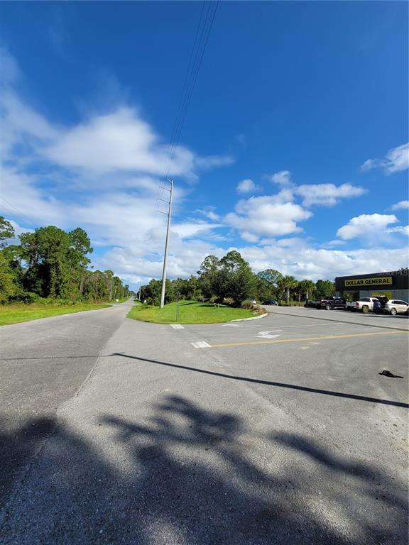 213 Clifton Road Crescent City, FL 32112 - Photo 37 of 51 a view of a road with a building in the background