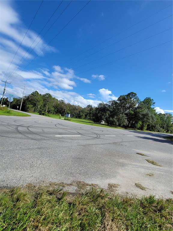 213 Clifton Road Crescent City, FL 32112 - Photo 40 of 51 a view of a road with a yard