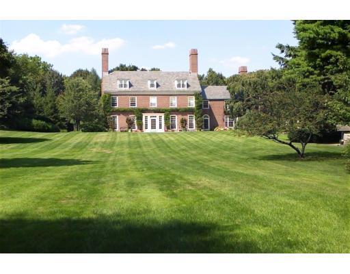 a view of a big building with a big yard