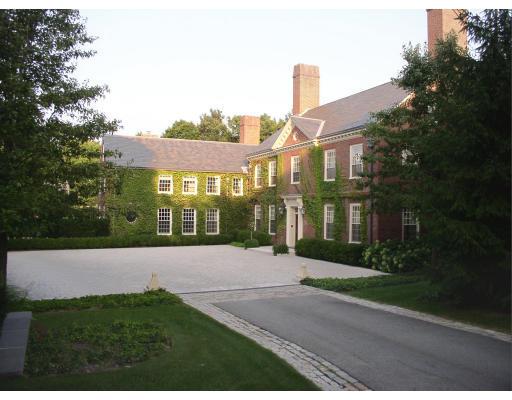 40 Cottage Street Brookline, MA 02445 - Photo 14 of 17 a front view of a house with yard and green space