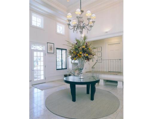 40 Cottage Street Brookline, MA 02445 - Photo 6 of 17 a dining room with chandelier and wooden floor
