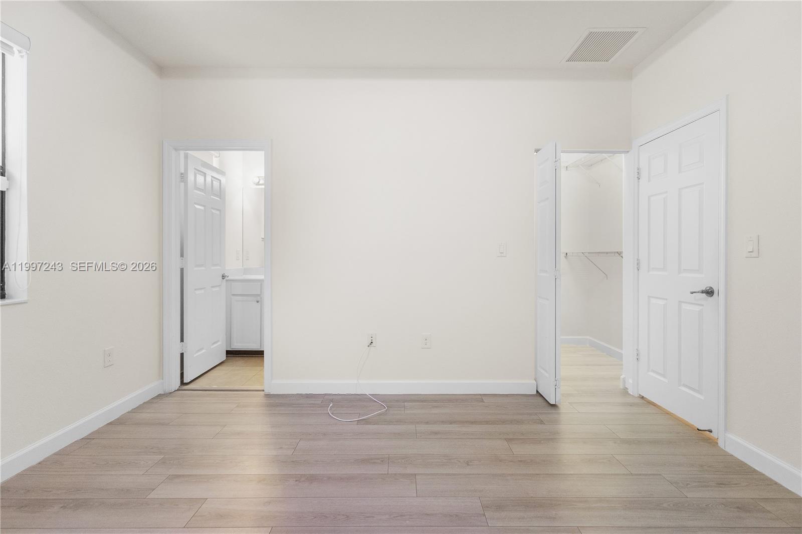 15075 Southwest 113th Terrace Miami, FL 33196 - Photo 22 of 36 a view of an empty room