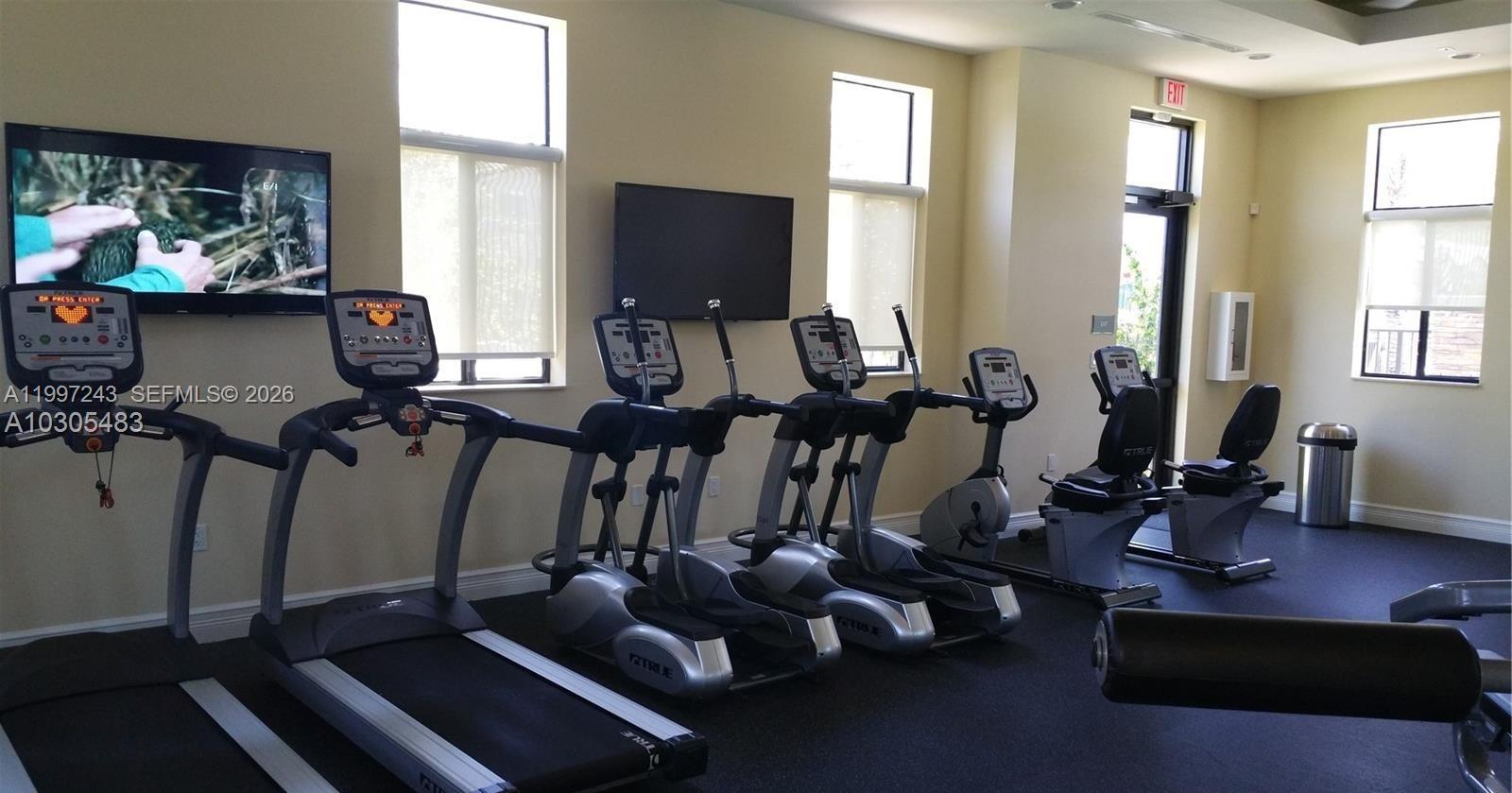 15075 Southwest 113th Terrace Miami, FL 33196 - Photo 35 of 36 a view of a room with gym equipment