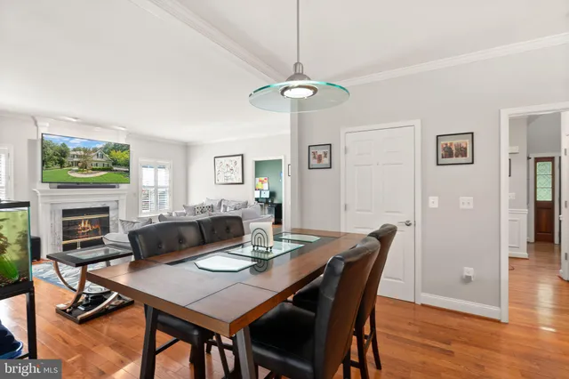 a workspace with furniture and a wooden floor