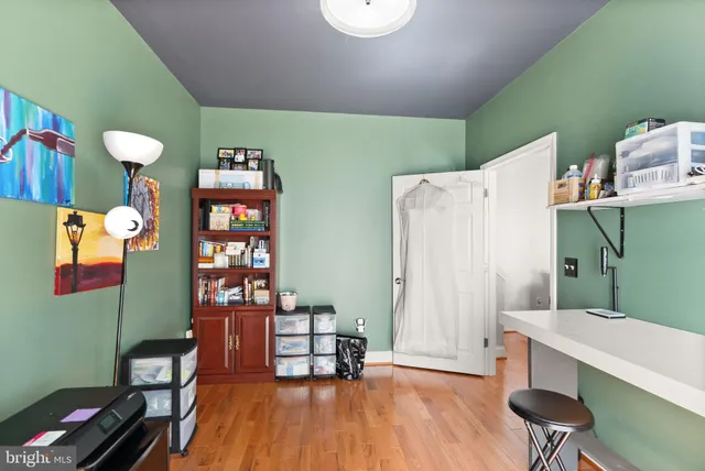 a spacious bathroom with a granite countertop tub sink and mirror