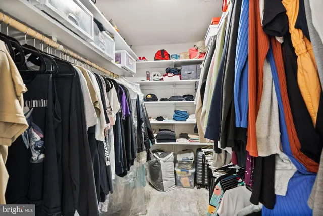 a living room with a couch and a stove