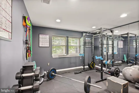 an aerial view of a house with yard